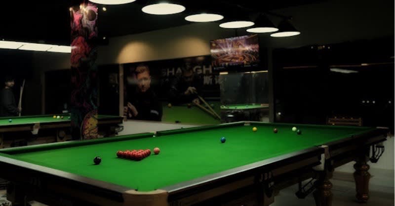 Snooker table with colorful balls arranged for a game in Delhi NCR